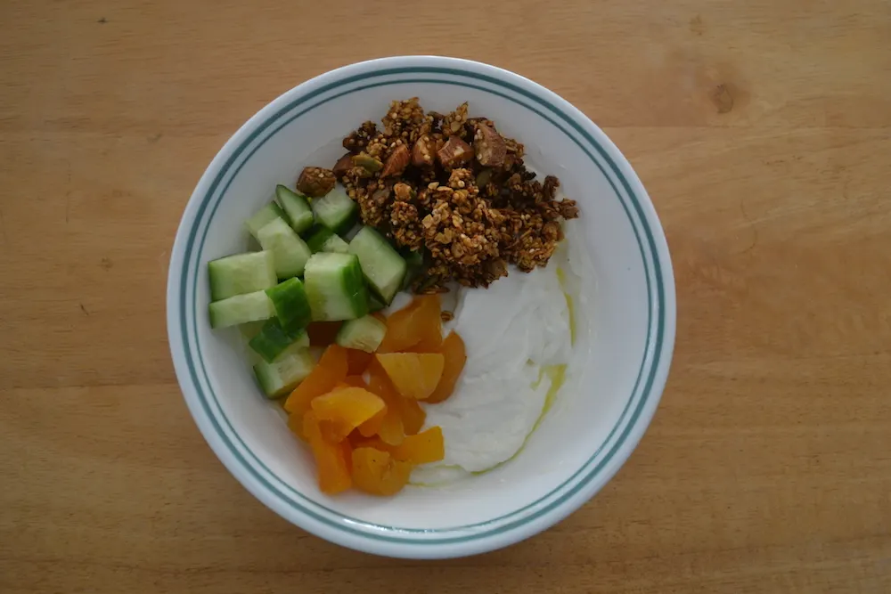 Savory Granola in a breakfast bowl with salted yogurt and cucumbers via BigTasteTinySpace