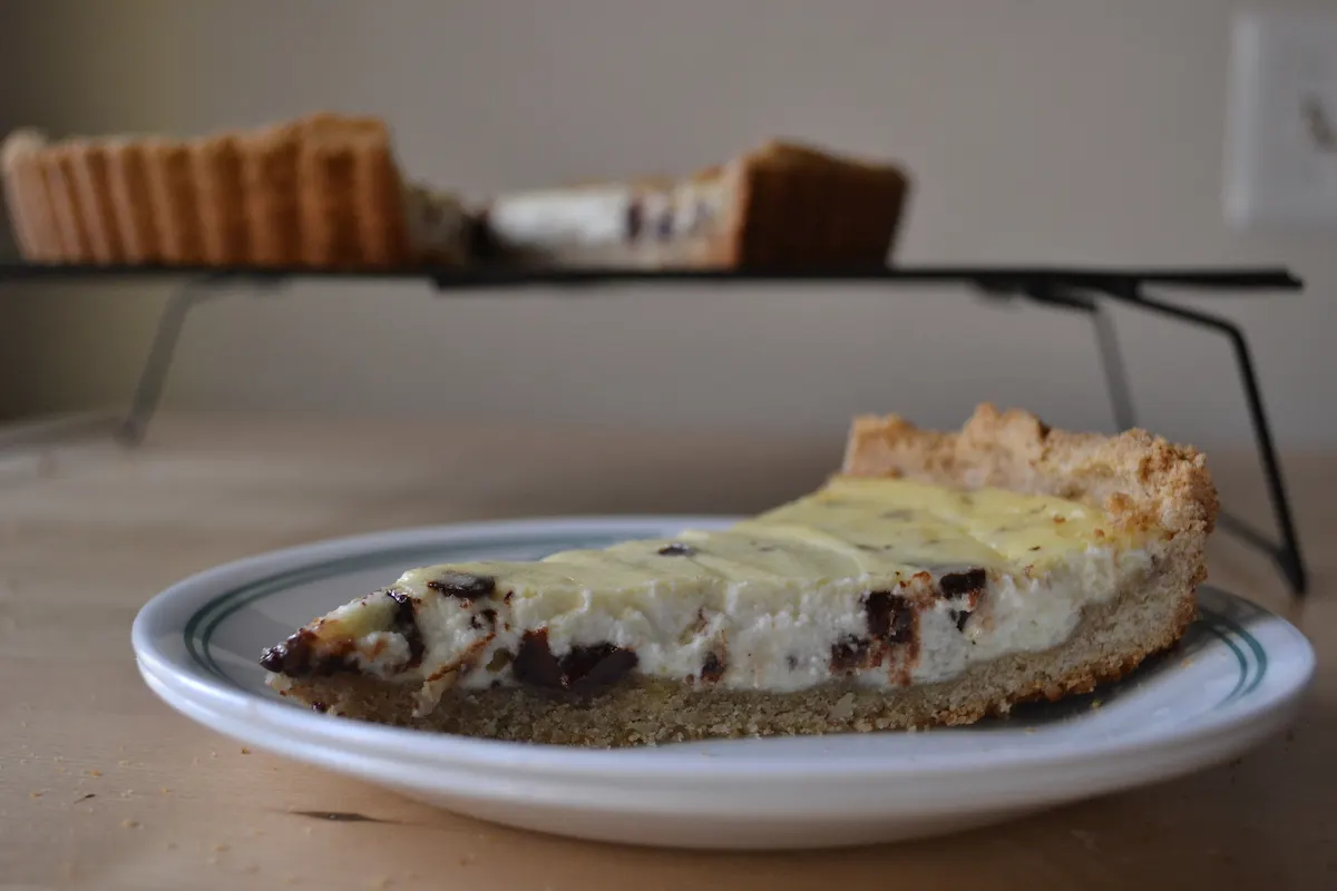 A slice of Cannoli Tart is the perfect snack. Full recipe on BigTasteTinySpace.com
