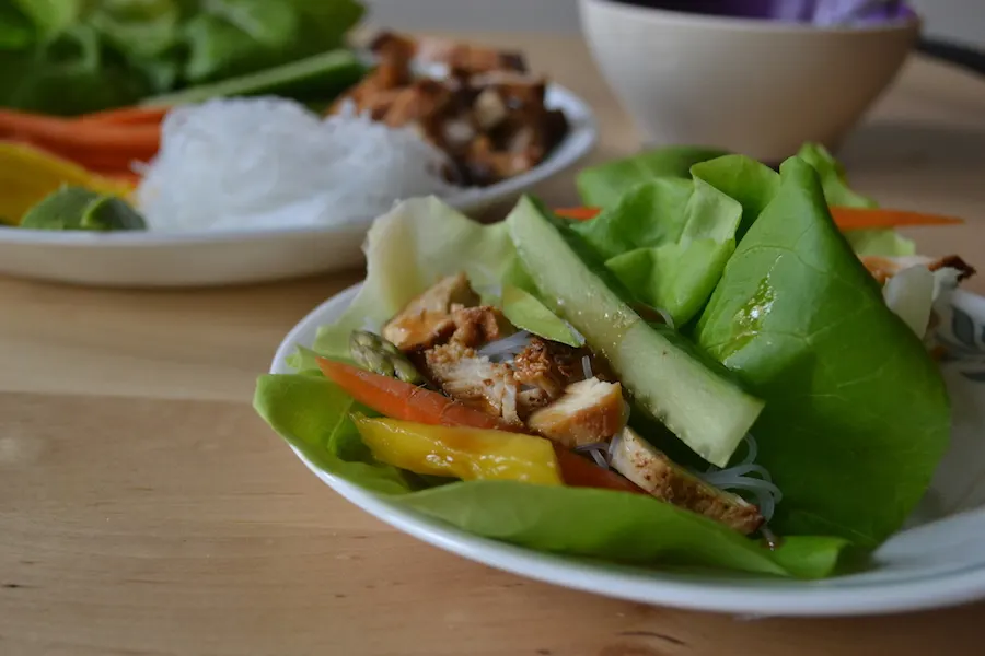 A tangle of rice noodles adds heft to my asian chicken lettuce wraps. Find the recipe on BigTasteTinySpace.com copy