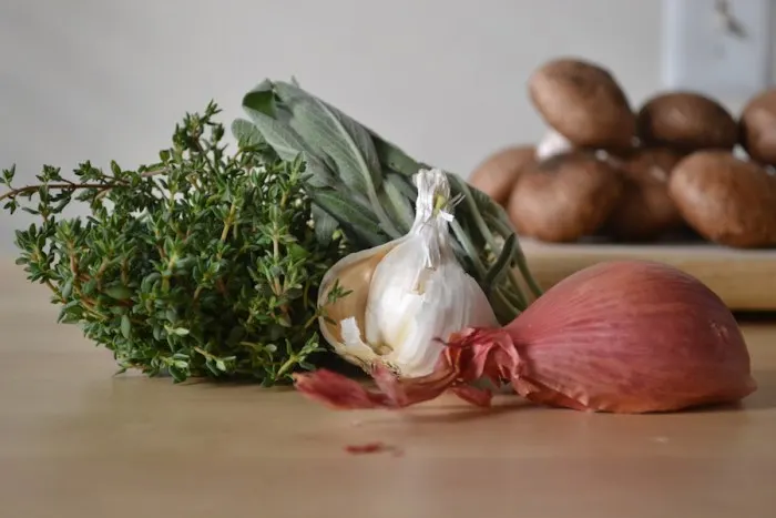 Garlic and herbs make for a delicious mushroom gravy. Full recipe on BigTasteTinySpace.com